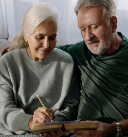 old couple looking at reverse mortgage options