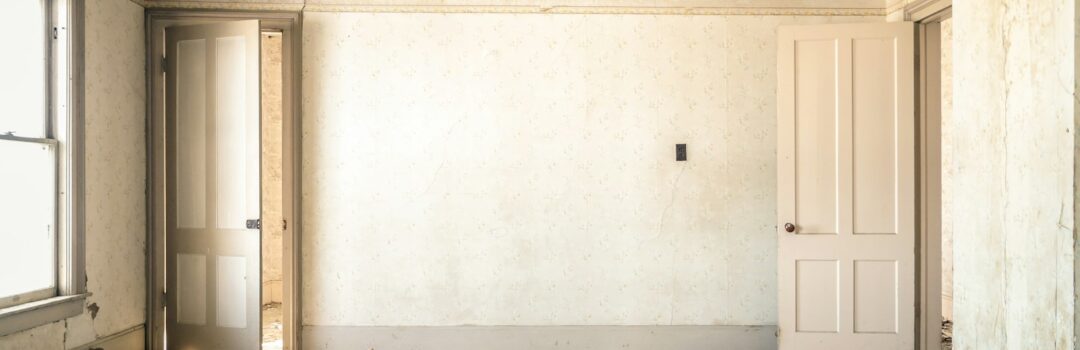 gray concrete walls with broken floor