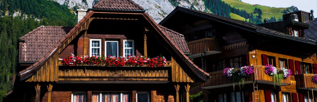 house with mountains in background